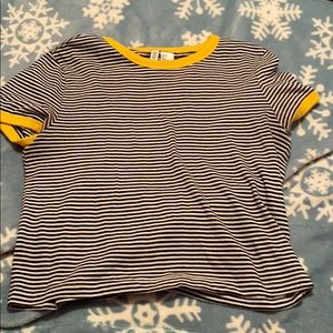 black and white striped shirt with yellow border
